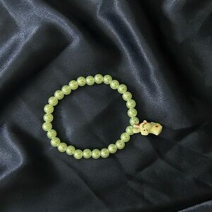 Green-ish blue Beaded Bracelet with unicorn Charm